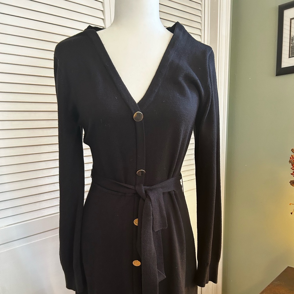 Black lightweight sweater dress, with gold buttons.
